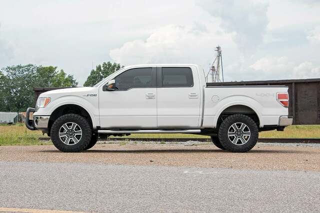 Fits Ford F-150 4WD (2009-2013) 3 Inch Lift Kit; 51013RED