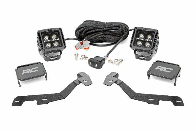Fits Ram 1500 (19-25) LED Light Kit; Ditch Mount; 2" Black Pair; White DRL 82289