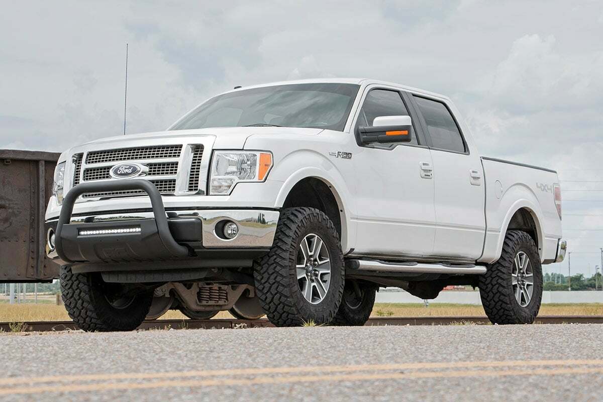 Fits Ford F-150 4WD (2009-2013) 3 Inch Lift Kit; 51013RED