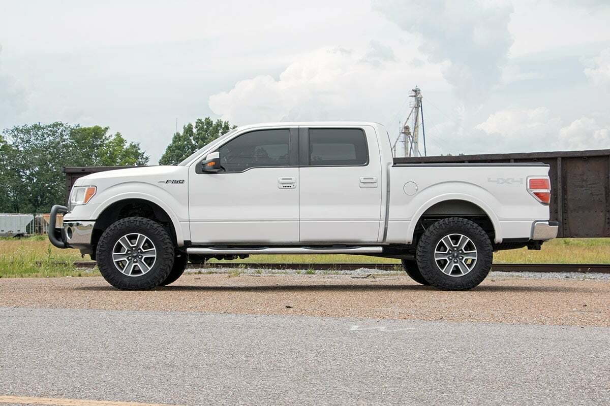 Fits Ford F-150 4WD (2009-2013) 3 Inch Lift Kit; 51013RED