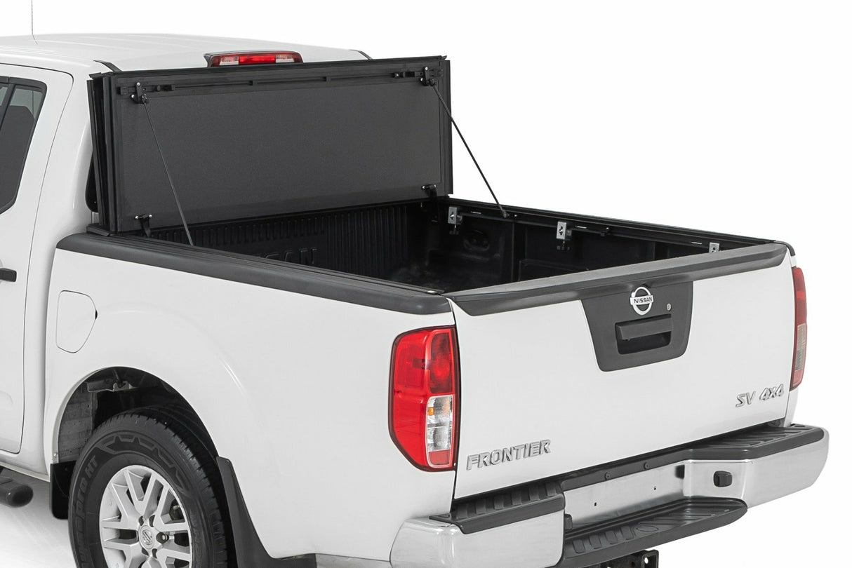 Fits Nissan Frontier (05-21) Hard Tri-Fold Flip Up Bed Cover 5' Bed 49520501