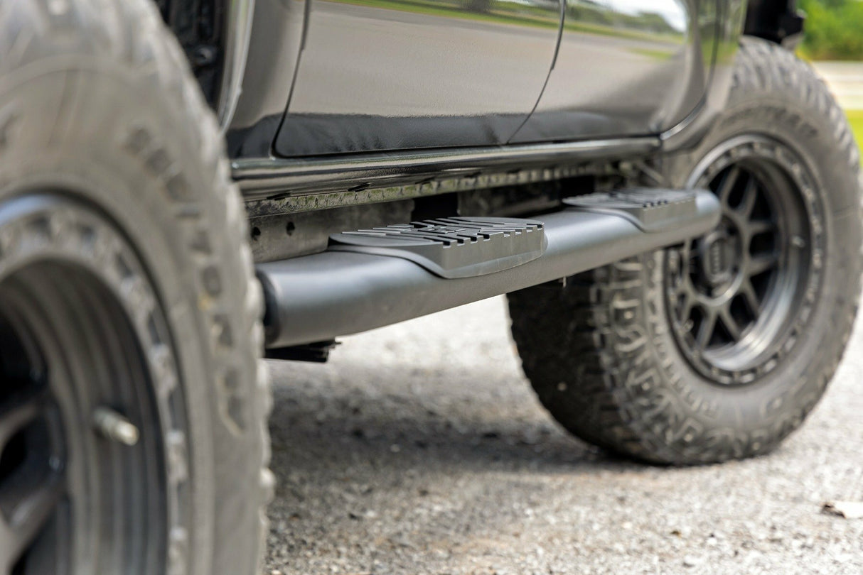 Fits Toyota Tacoma 2WD/4WD (2005-2023) Oval Nerf Step; Double Cab; Black; 21008